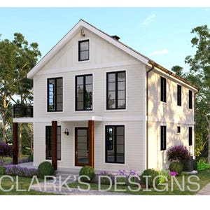 May include: A three-storey white house with black window frames and a dark brown front door. The house has a balcony and is surrounded by green grass, trees, and purple flowers. The text "CLARK'S DESIGNS" is at the bottom.