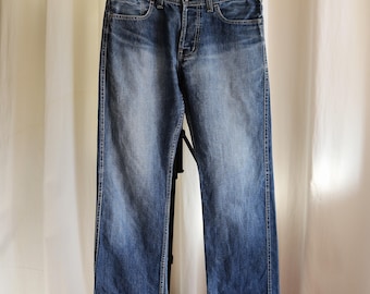 Spodnie jeansowe Vintage Y2K Tommy Hilfiger Wyatt z prostymi nogawkami i średnim stanem - rozmiar 33"