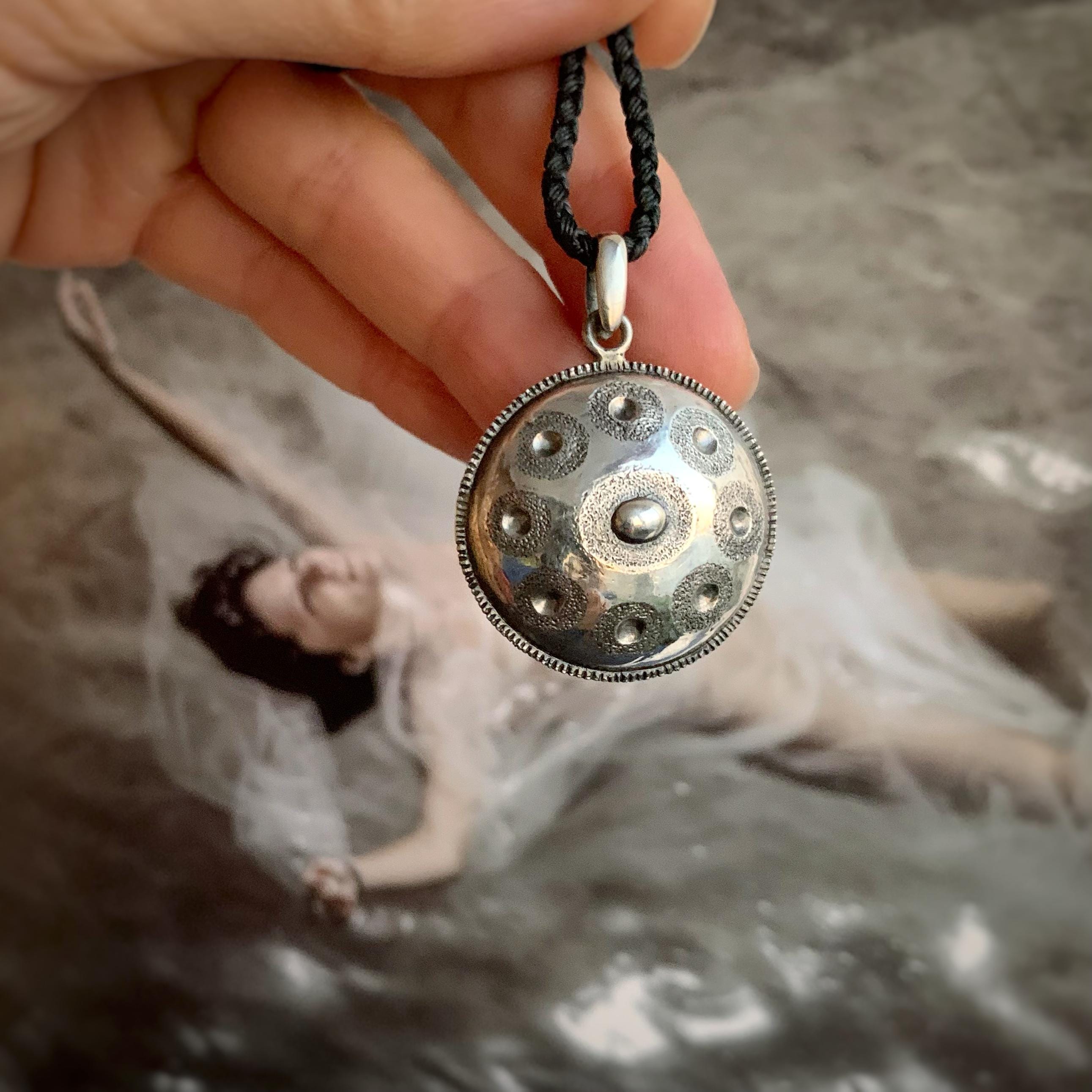 Handpan Silver Amulet - Harmonic Hang Drum Pendant for Music Lovers