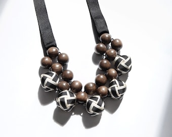 Black & White Beaded Necklace made with Natural Gray Wood and Ribbon Woven Beads with adjustable Ribbon ties