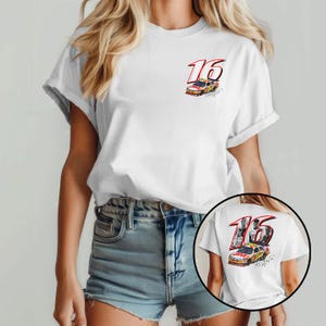 May include: White t-shirt with a graphic of a race car and the number 16 in red and black. The design is on the front and back of the shirt. The shirt is made of a soft material.