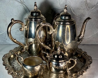 Vintage WM A Rogers Silver Plated Coffee Tea Service. One of the coffee tea pot lid it’s loose