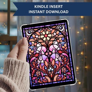 May include: A tablet displaying a stained-glass design with a floral pattern in pink, purple, orange, and blue. The tablet has a black border and the text "KINDLE INSERT INSTANT DOWNLOAD" in a navy blue banner.