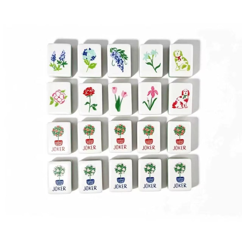 May include: A set of twenty rectangular white tiles arranged in a grid. The top two rows feature colorful illustrations of various flowers and dogs. The bottom two rows display potted topiary trees with the word JOKER printed in red or blue below.