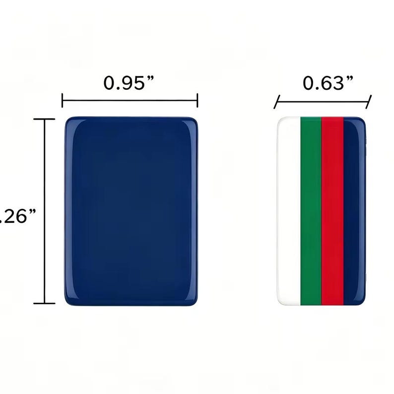 May include: Two rectangular tiles. The left tile is solid dark blue, measuring 0.95 inches wide by 1.26 inches high. The right tile features vertical stripes of white, green, red, and dark blue, with a width of 0.63 inches.