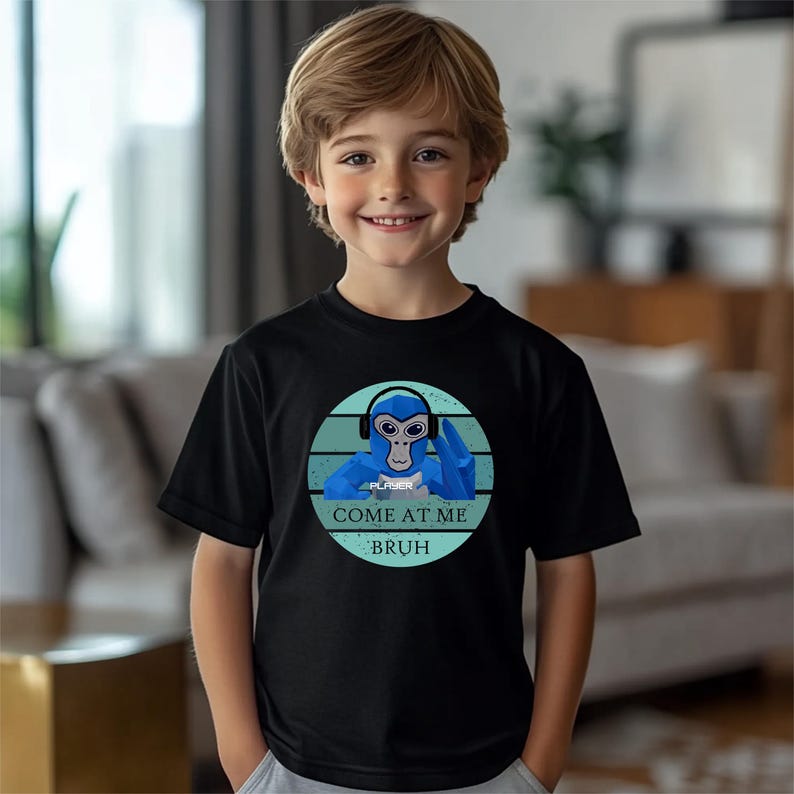 a young boy wearing a t - shirt with a picture of a dog on it
