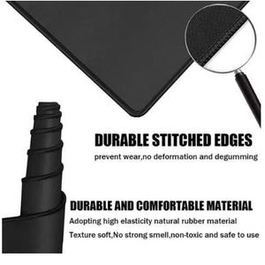 May include: Black rectangular mouse pad with stitched edges. The image shows a close-up of the edge stitching and a rolled-up section of the pad. Text on the image reads "Durable Stitched Edges" and "Durable and Comfortable Material".