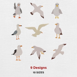 Könnte beinhalten: Neun gestickte Möwen-Designs in verschiedenen Posen, mit grauen, weißen und braunen Details. Der Text "9 Designs" und "10 SIZES" ist rot am unteren Bildrand dargestellt. Die Möwen befinden sich auf weißem Hintergrund.