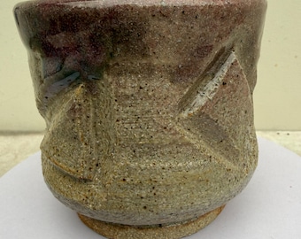 Handmade carved ceramic tea cup inspired by the aesthetics of Wabi Sabi, Yunomi style
