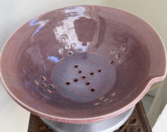 Handmade ceramic fruit bowl, mauve and blue, deformed rim, drainage holes