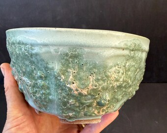 Small handmade ceramic succulent/cacti planter, textured exterior surface, sage green and lava glazes, wabi sabi