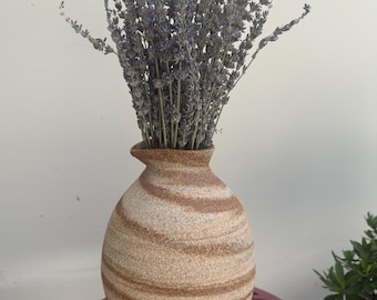 Handmade ceramic vase, swirling clay pattern, deformed rim, unglazed exterior, wabi sabi