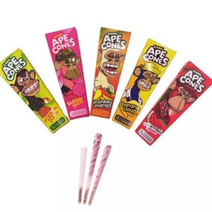 May include: Five brightly coloured boxes of pre-rolled cones, each with a cartoon ape design. Flavours include pineapple punch, bubble gum, monkey mango, banana cloud, and watermelon splash. Three pink and white cones are in the foreground.
