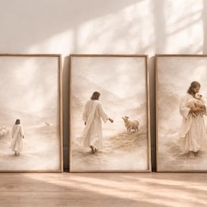 Puede incluir: Conjunto de tres impresiones artísticas enmarcadas. Cada impresión presenta una ilustración en tonos sepia de una figura con una túnica blanca y una oveja. La primera impresión muestra a la figura caminando hacia un rebaño. La segunda muestra a la figura con una oveja. La tercera muestra a la figura sosteniendo una oveja.