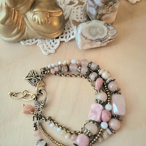 Unique multi-strand boho-style bracelet with natural stones in shades of dusty rose and cream