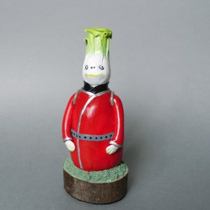 Figura de col antropomórfica: escultura vegetal de arcilla polimérica
