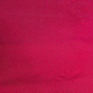 May include: A solid magenta fabric with a visible woven texture. The material displays a consistent deep pink hue across the entire surface, characterized by a tight, uniform weave pattern that creates a subtle grid-like appearance throughout.