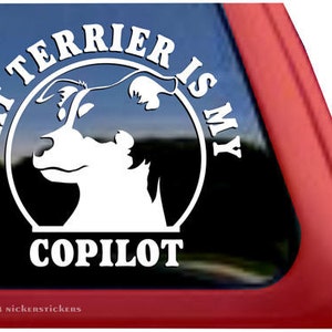 May include: White vinyl decal with the text "Rat Terrier is my Copilot" in a circle with a silhouette of a Rat Terrier dog inside the circle.
