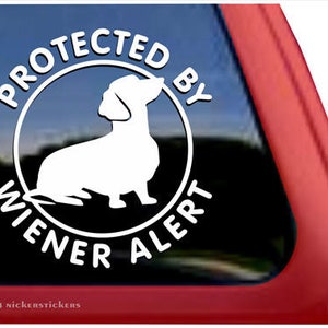 Protected By Wiener Alert | DC337PBY | High Quality Adhesive Vinyl Window Decal Sticker