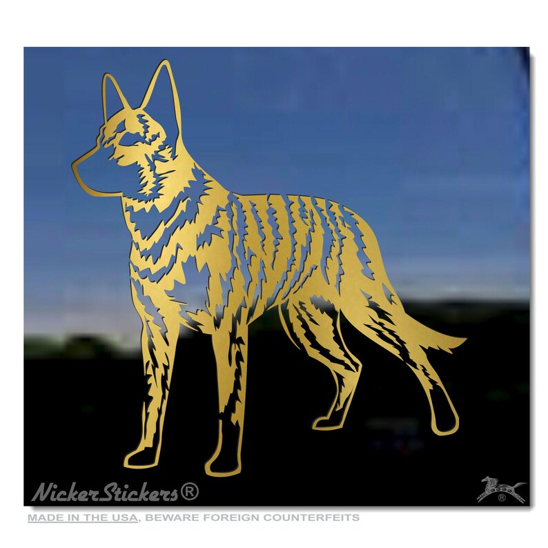 May include: Gold silhouette of a Cardigan Welsh Corgi dog breed. The silhouette is detailed with a textured pattern. The image has a black background with the text "Nicker Stickers" and "Made in the USA, Beware Foreign Counterfeits".