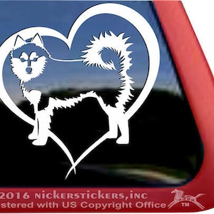 May include: White silhouette of a Siberian Husky dog inside a heart shape. The heart has a swirl design at the bottom.