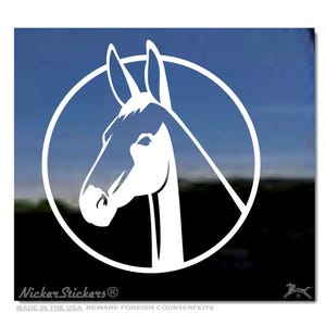 May include: White vinyl sticker featuring a donkey's head inside a circle. The donkey is depicted in profile, with long ears and a detailed face. The sticker has a clean, minimalist design, suitable for various applications. The text "Nicker Stickers" is at the bottom.