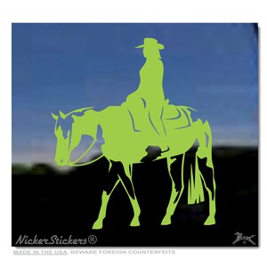 May include: A lime green silhouette of a person riding a horse. The image is a decal sticker. The text "Nicker Stickers" is at the bottom of the image.