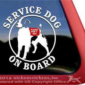 May include: White decal with a black outline of a service dog with the text "SERVICE DOG ON BOARD" and "PLEASE DON'T PET" on the dog's vest.
