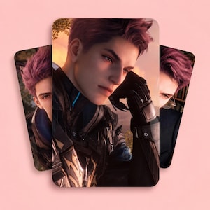 May include: Three rectangular trading cards featuring a digital illustration of a person with short, vibrant purple hair. The character wears a dark, structured tactical suit with metallic gold accents and black gloves, set against a sunset background.