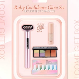 May include: A pink Ruby Confidence Glow Set gift box. The set includes a facial massager, a tube of primer, an eyeshadow palette, and a set of gel nail polish. The text "Ruby Confidence Glow Set" is displayed on the packaging.