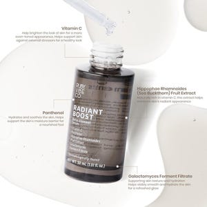 Model's hydrated, radiant complexion after applying Ruby Vibe Co Radiant Boost Serum, showing smooth, luminous finish.