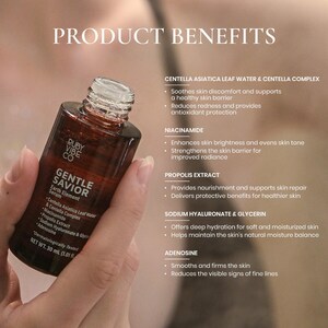 Model applying Ruby Vibe Co Gentle Savior Earth Element Serum to face, enhancing smoothness and hydration.