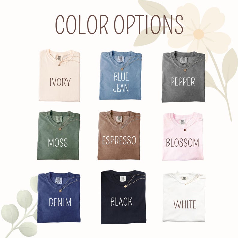 May include: Nine folded t-shirts in various colors, including ivory, blue jean, pepper, moss, espresso, blossom, denim, black, and white. Each shirt has a necklace and is labeled with its color name. The text "COLOR OPTIONS" is at the top.