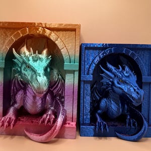 May include: Two dragon sculptures, one in green, purple, and orange, the other in blue. Each dragon is framed within an arched doorway. The dragons have detailed scales and horns, with a fantasy theme.