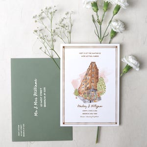 May include: A white wedding invitation card featuring a watercolor illustration of a brown brick building, with text reading Meet us at the lighthouse, We're getting married, Haley & Nitzan, 5:00pm June 12, 2016, Brooklyn, New York, dinner + dancing to follow.