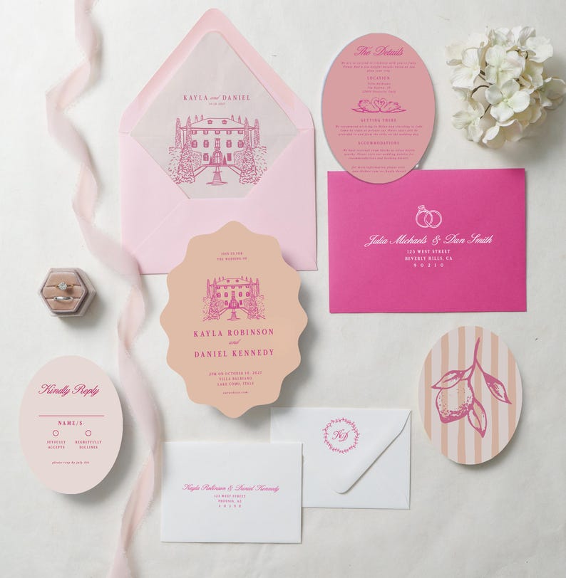 May include: A wedding stationery suite featuring pink and peach envelopes, cards, and an oval detail card. Includes a scalloped invitation with a mansion illustration, a reply card, and a ring box. Text includes Kayla and Daniel, The Details, and Kindly Reply.