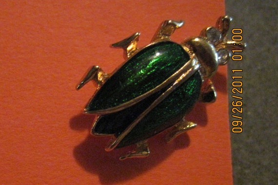 Vintage Avon Green Enamel Beetle Tac Pin w/ Rhine… - image 1
