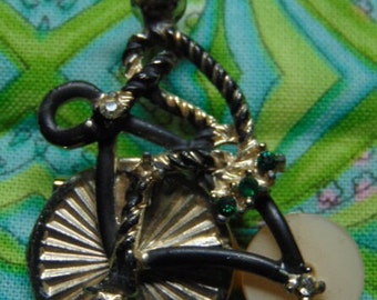 BEAUTIFUL VINTAGE 50's Figural Realistic Shape Black Enamel Man Riding Silver Bicycle Brooch w/ Crystal & Mother of Pearl Wheel  ....9303