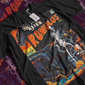 May include: Black t-shirt featuring a comic book style graphic with the words "ALIEN ROMULUS" in orange and white. The graphic includes a skeletal alien figure, a woman's portrait, and the text "SPACE ONE CAN HEAR YOU".