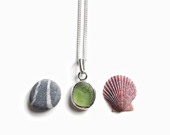Green sea glass & sterling silver pendant.