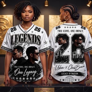 May include: White baseball jersey with black and silver accents, featuring the text "LEGENDS Built Different" and images of two men. The jersey has the number "26" on the front and back, with the text "TWO ICONS. ONE IMPACT. One Legacy" on the front.