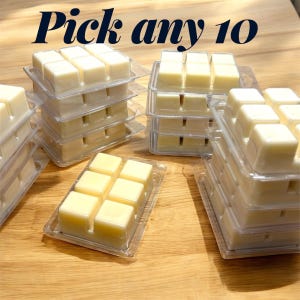 May include: A set of three ceramic mugs with a speckled, matte finish. The mugs are in shades of cream, light gray, and dark gray. Each mug has a simple, minimalist design, perfect for coffee or tea.