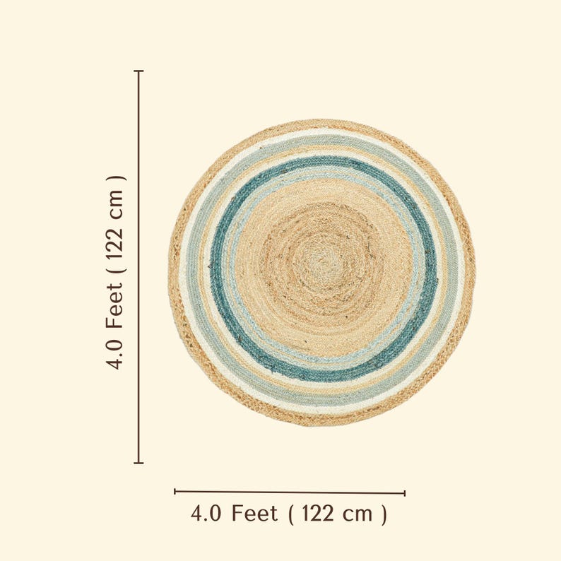 May include: A round braided rug featuring concentric circles of natural tan, light blue, and dark teal fibers. The rug measures 4.0 feet (122 cm) in diameter as indicated by the text labels on the side and bottom of the image.
