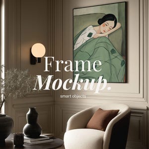 May include: A framed art print featuring a woman resting on a green sofa, with the text "Frame Mockup" in white. The scene includes a modern chair, a round table, and decorative vases, creating a cozy interior design setting.