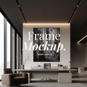 May include: A rectangular black frame containing an abstract black and white painting hangs on a white wall above a desk in an office. The text "Frame Mockup. smart objects" is overlaid in white. A brown armchair sits to the left of the desk.