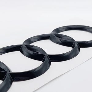 203 mm x 71 mm A3 A4 A5 A6 Q3 Q5 AUDI bakre bagageringar, emblem för bagageluckan, blank svart