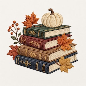 May include: An embroidery design featuring a stack of four books in dark green, maroon, brown, and navy blue. A cream-colored pumpkin sits on top, accompanied by orange maple leaves and a sprig of small round berries on the left side of the stack.