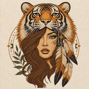 May include: An intricate embroidery design featuring a person with long brown hair wearing a tiger headpiece. The artwork includes decorative feathers on the side, green leaves, and geometric shapes arranged in a circular pattern on a light fabric.
