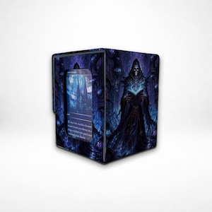 May include: A rectangular deck box for trading cards featuring a dark fantasy illustration of a hooded skeleton figure holding a glowing blue book. The box has a clear window on the front displaying a card with a stained glass window design.