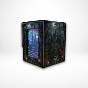 May include: A rectangular deck box featuring a dark, gothic landscape with a stone staircase leading to a castle under a moonlit sky. The front panel displays a blue-toned trading card with visible text, framed by dark trees and glowing lanterns.
